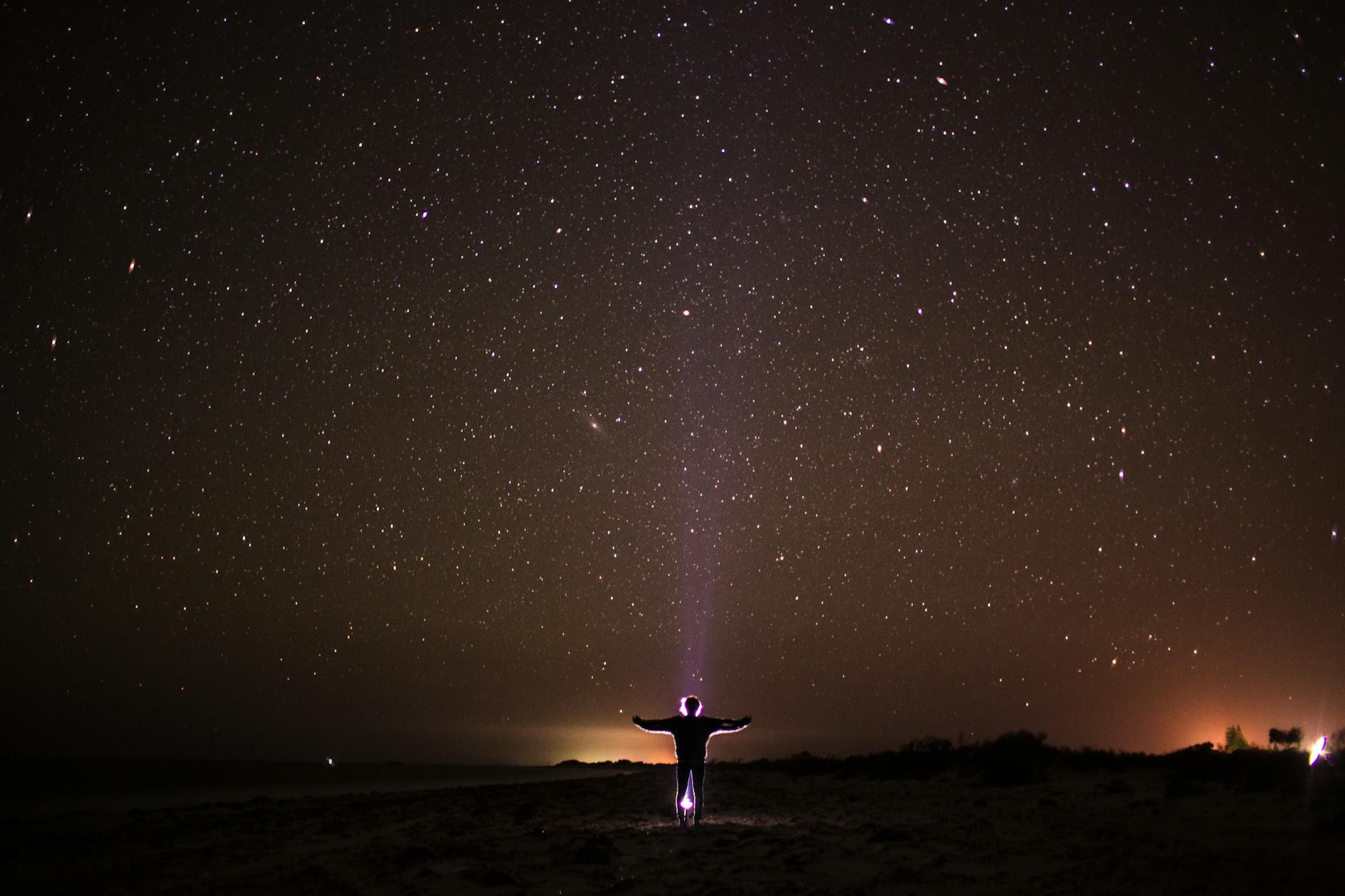person under sky full of stars
